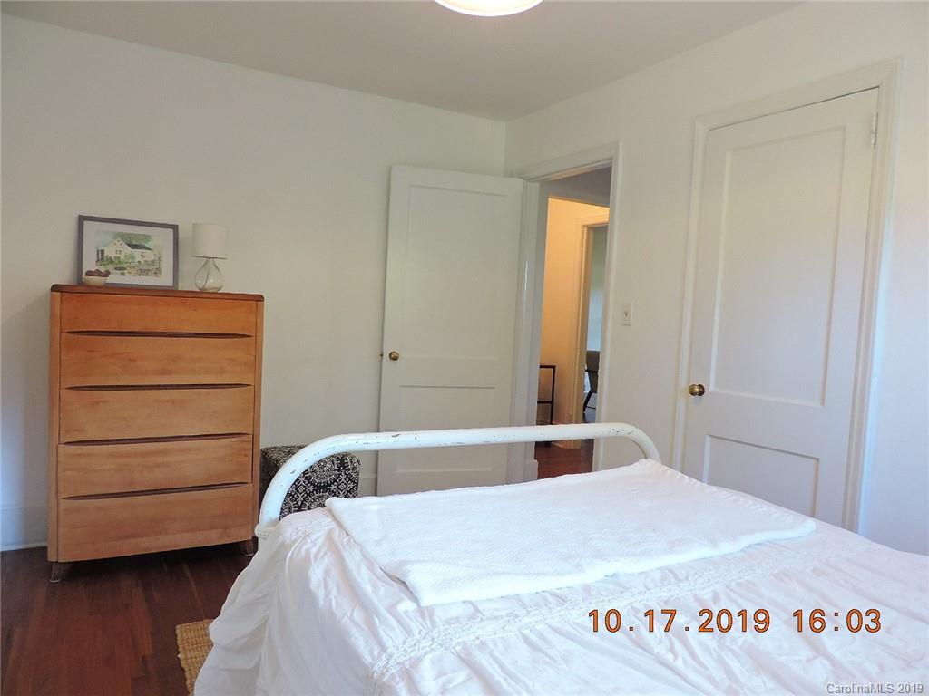 5908 Tuckaseegee Road Charlotte, NC 28208 - Photo 18 of 30 a bedroom with a bed and a dresser