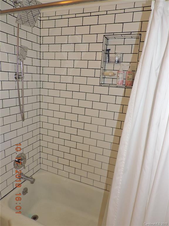 5908 Tuckaseegee Road Charlotte, NC 28208 - Photo 20 of 30 a bathroom with a bathtub