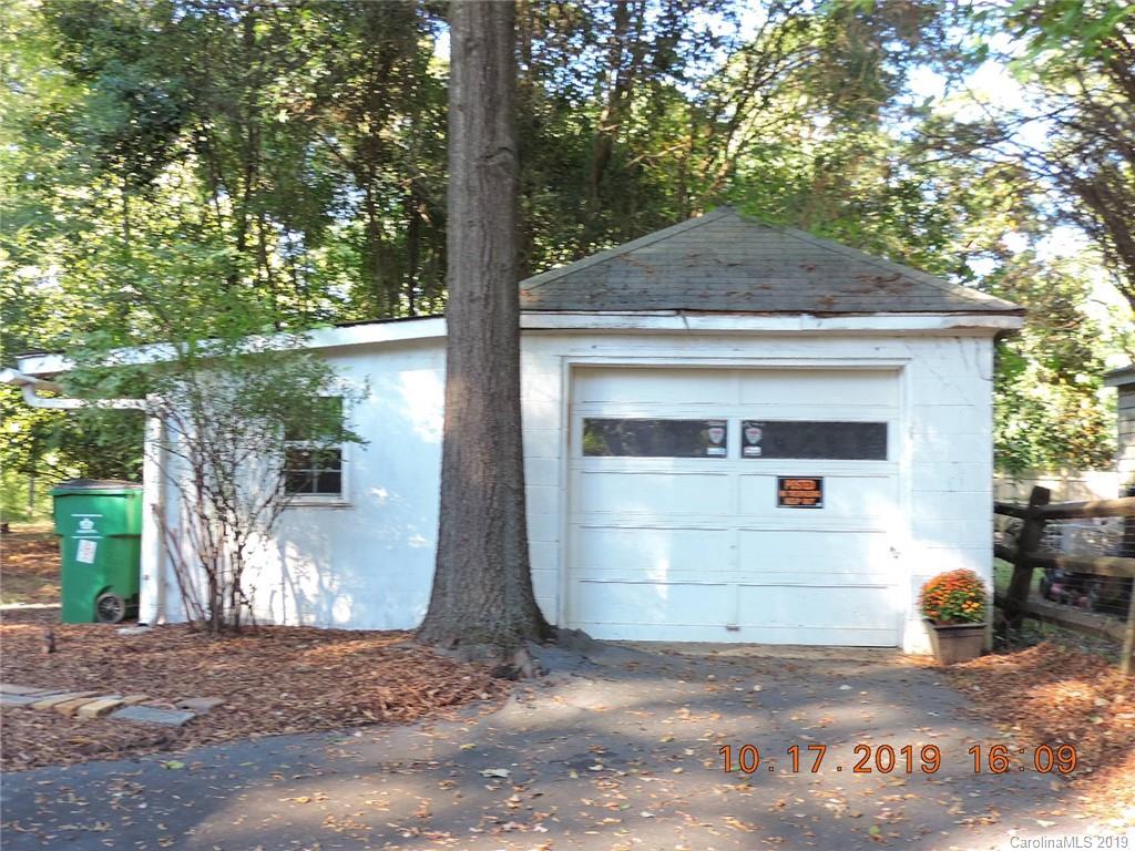 5908 Tuckaseegee Road Charlotte, NC 28208 - Photo 30 of 30 a front view of a house with garage