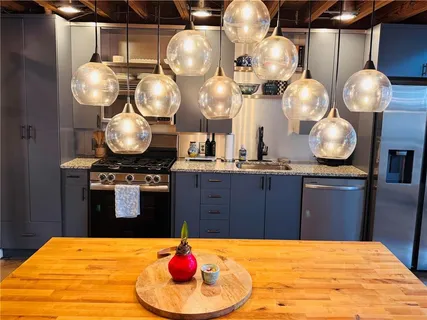 a kitchen with a chandelier