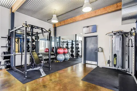 a view of a room with gym equipment