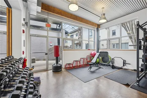 a view of a room with gym equipment