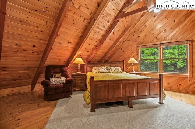 a backyard of a house with sofas