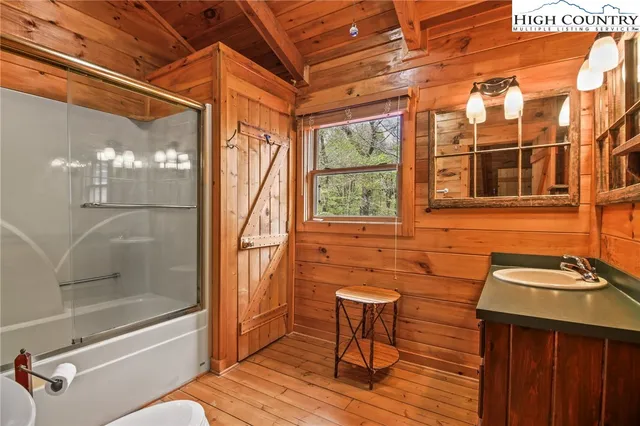 a view of porch with wooden floor