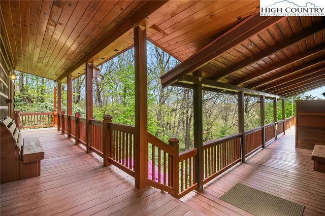 a view of balcony with wooden floor