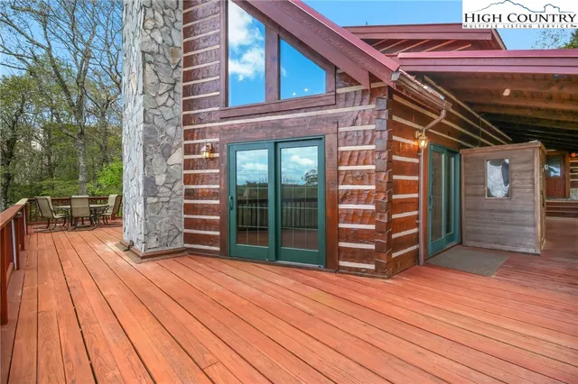 a view of a chairs on the deck