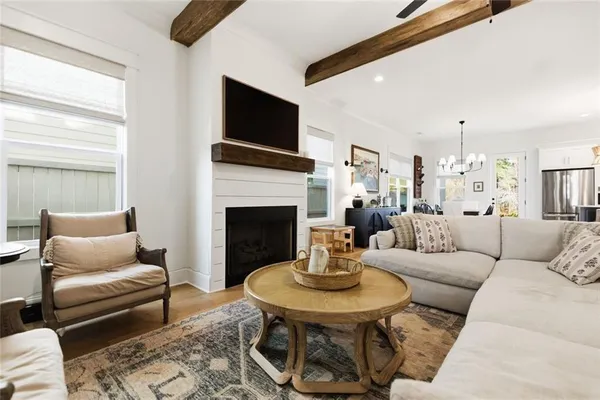 a kitchen with stainless steel appliances granite countertop a stove oven and a refrigerator