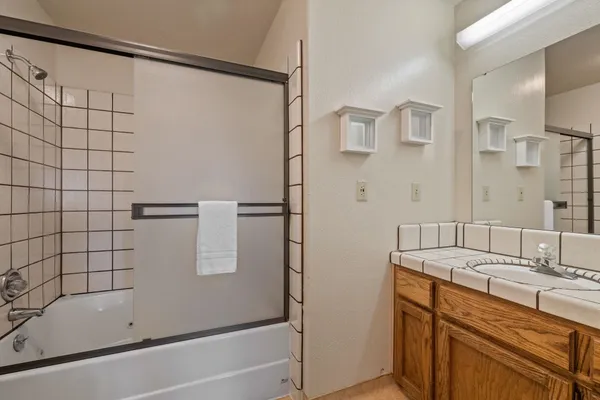 a bathroom with a sink and a bathtub