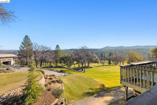 a view of a swimming pool with an ocean view