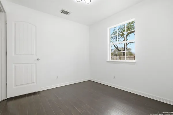 an empty room with a window