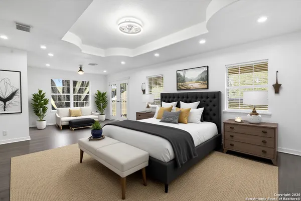a bed room with bed and window