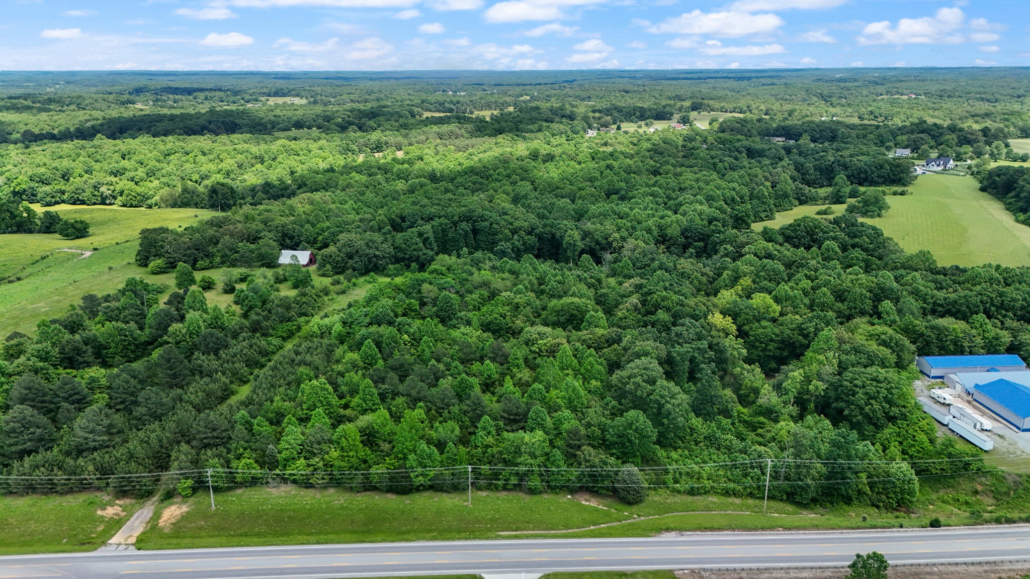 0 Highway 46 Dickson, TN 37055 - Photo 2 of 16 a view of an outdoor space and a yard