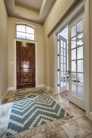 a view of an empty room and window