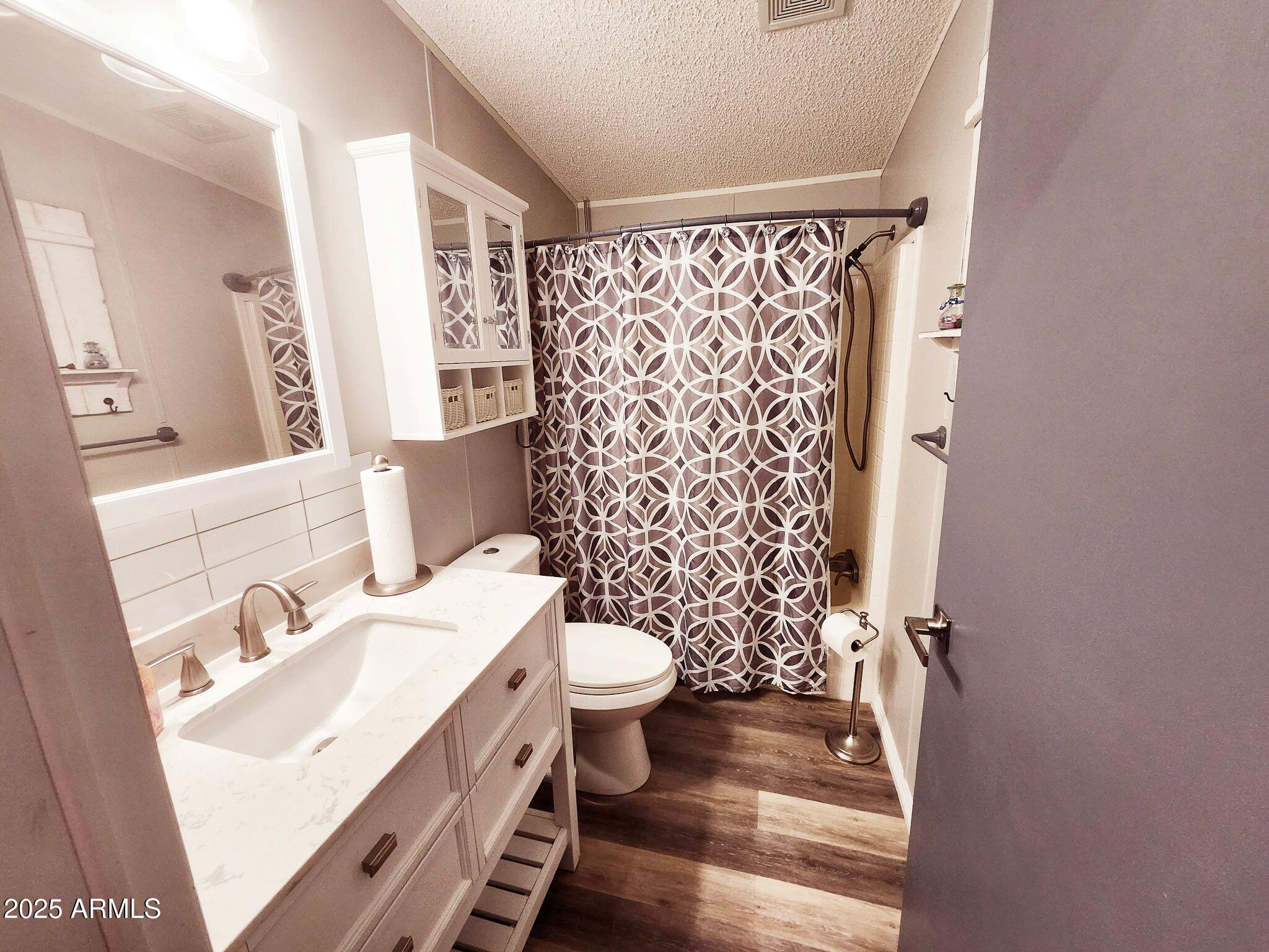 3700 South Tomahawk Road, Unit 18 Apache Junction, AZ 85119 - Photo 13 of 21 a bathroom with a sink and toilet