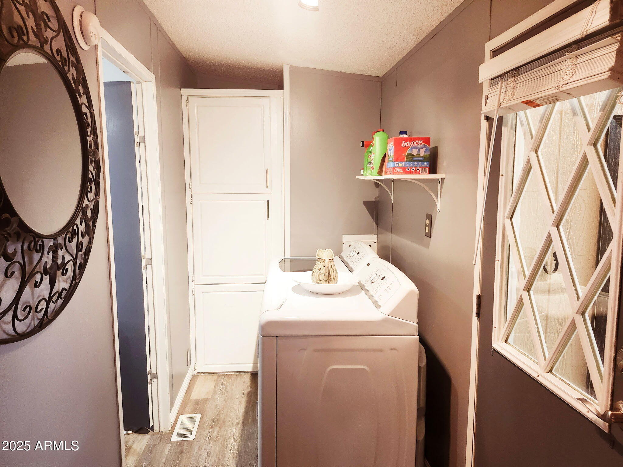 3700 South Tomahawk Road, Unit 18 Apache Junction, AZ 85119 - Photo 16 of 21 a utility room with dryer and washer
