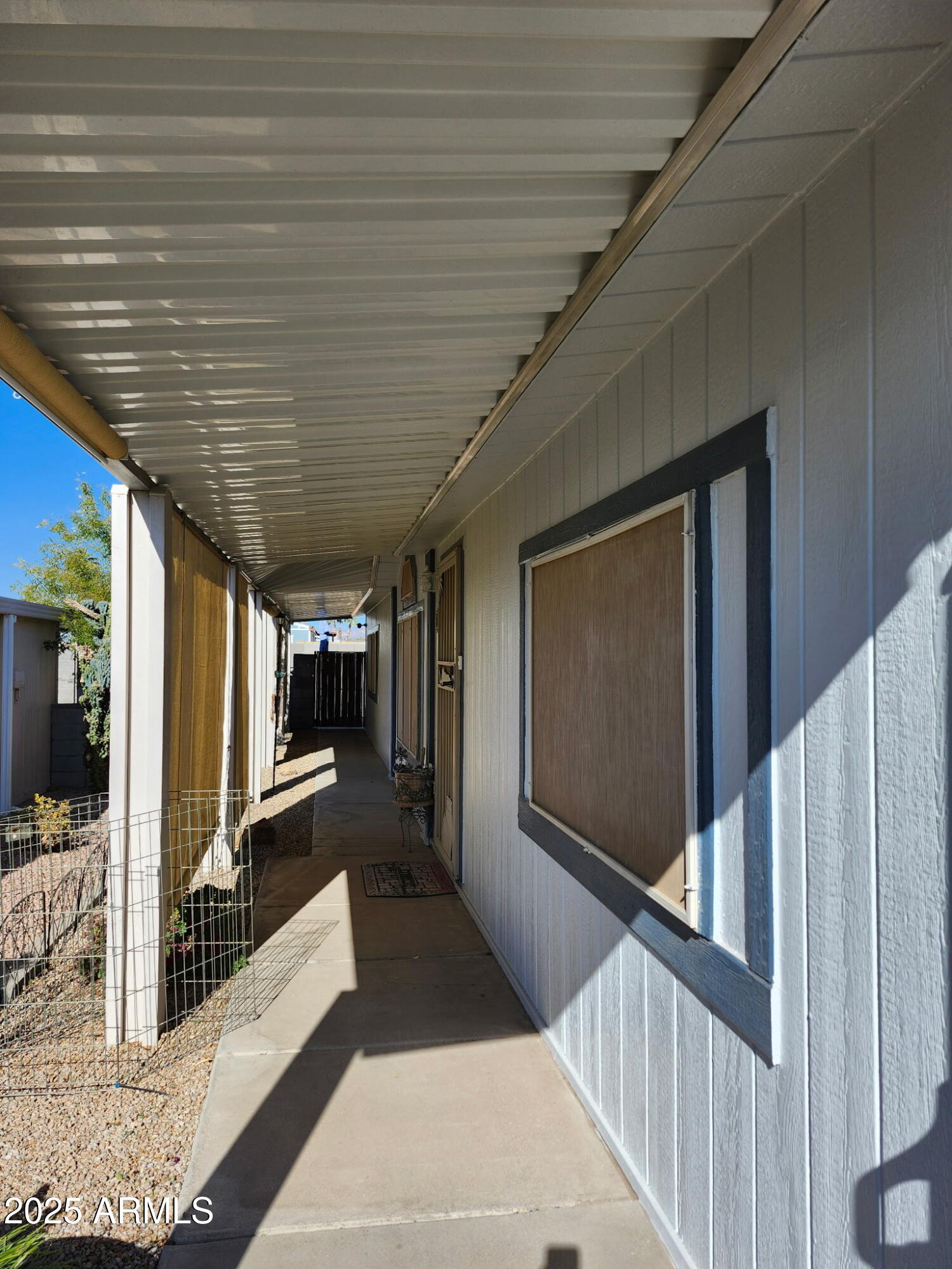 3700 South Tomahawk Road, Unit 18 Apache Junction, AZ 85119 - Photo 17 of 21 a view of a porch