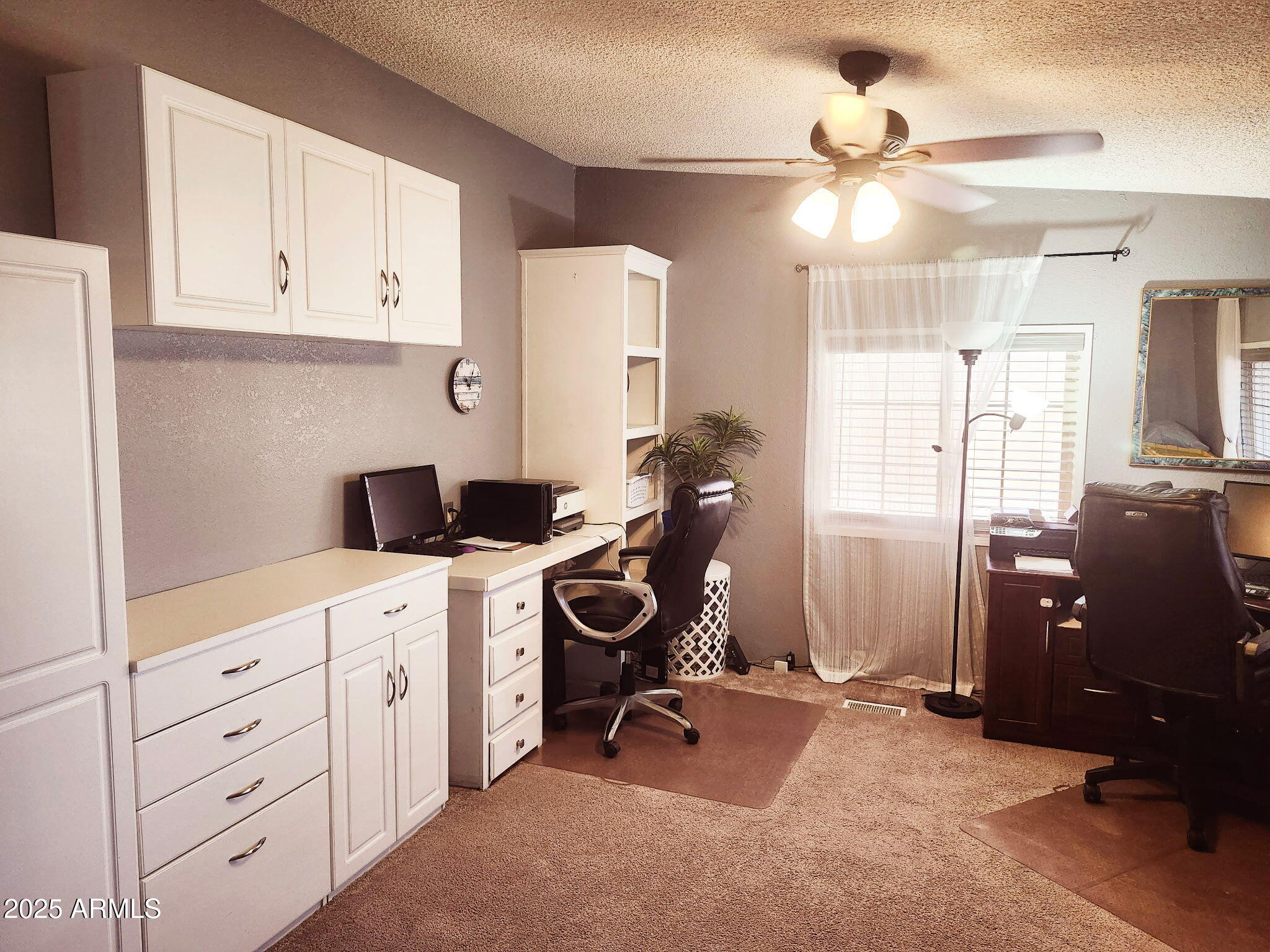 3700 South Tomahawk Road, Unit 18 Apache Junction, AZ 85119 - Photo 5 of 21 a view of a room with gym equipment