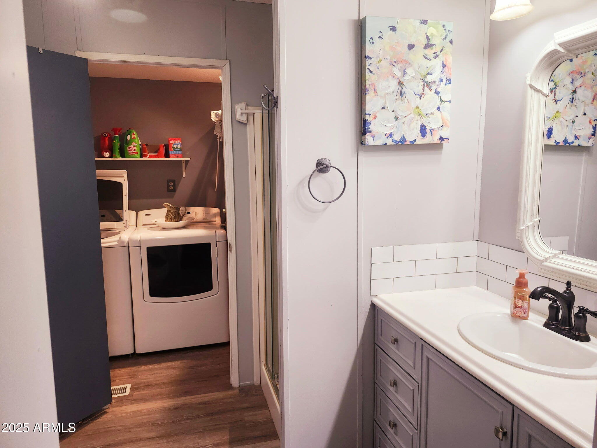 3700 South Tomahawk Road, Unit 18 Apache Junction, AZ 85119 - Photo 6 of 21 a utility room with a sink a washer and dryer