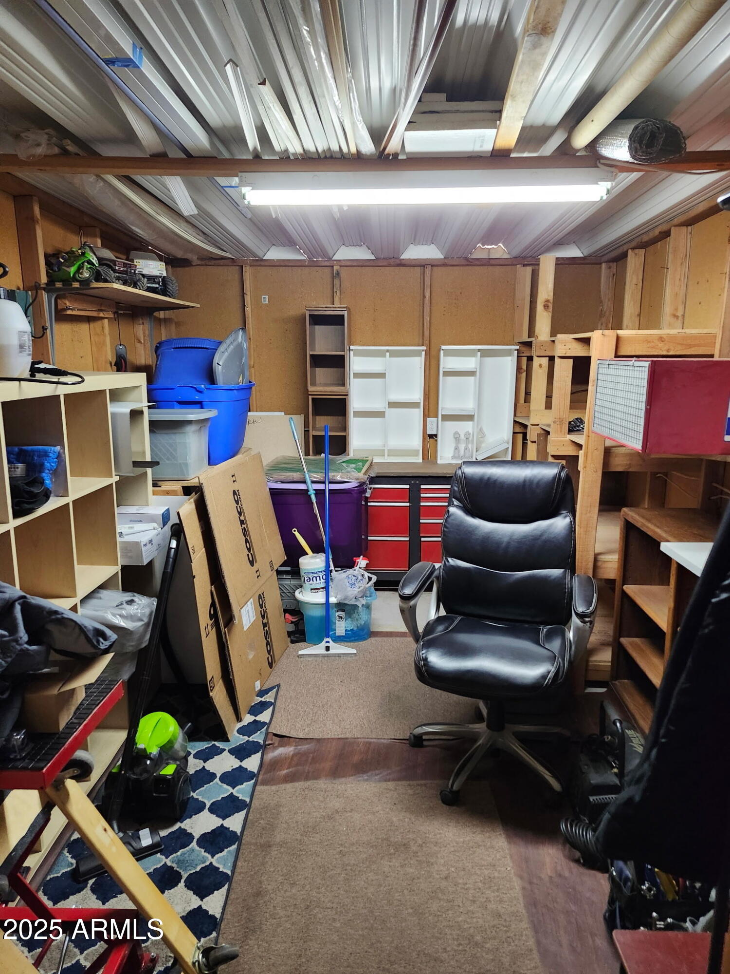 3700 South Tomahawk Road, Unit 18 Apache Junction, AZ 85119 - Photo 8 of 21 a storage room with furniture