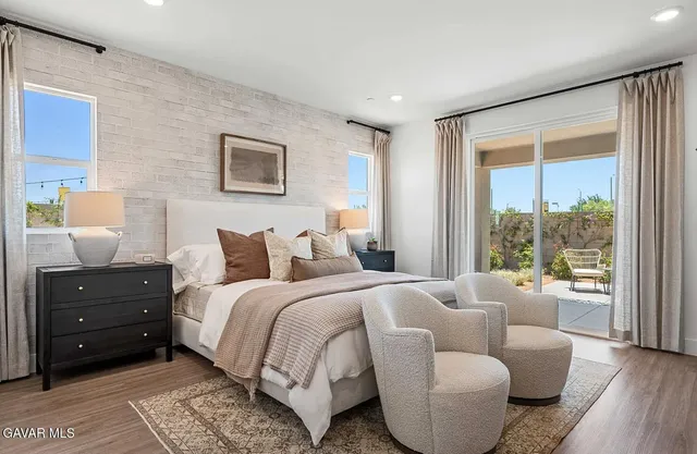 a bed room with a bed and a couch