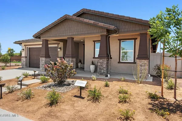 a view of a house with patio
