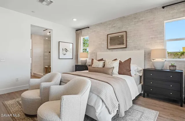 a bed room with bed and a couch