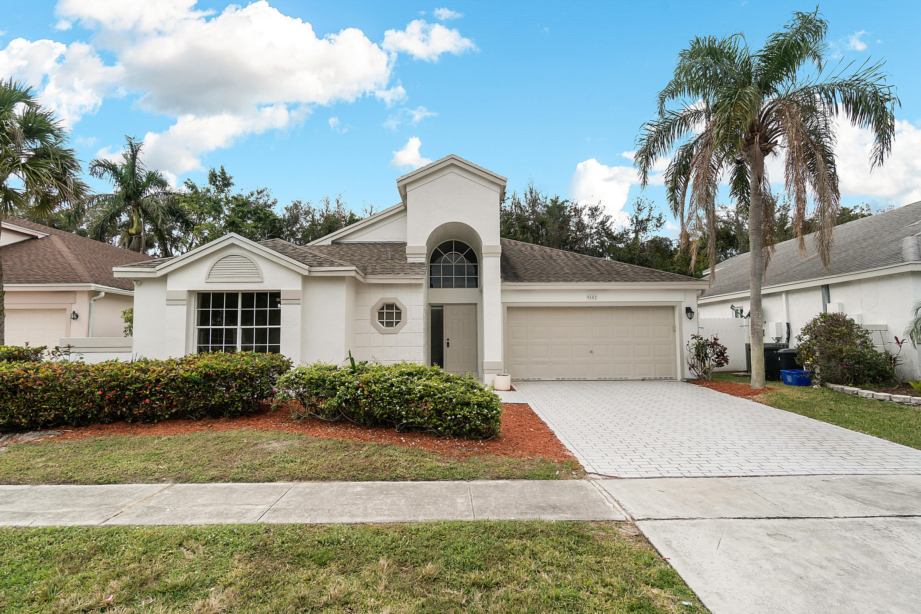 9502 Aegean Drive Boca Raton, FL 33496 - Photo 1 of 25 Front Exterior