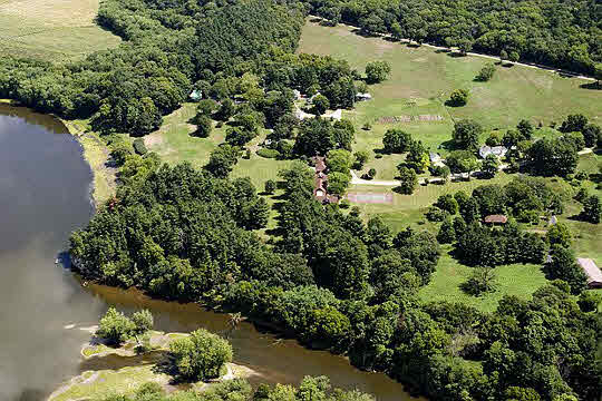 2856 South Lowden Road Oregon, IL 61061 - Photo 1 of 8 an aerial view of a house with a yard and lake view