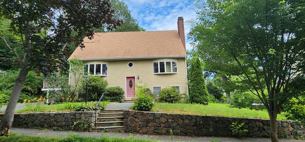 46 James Street Beverly, MA 01915 - Photo 1 of 1 a front view of a house with a yard