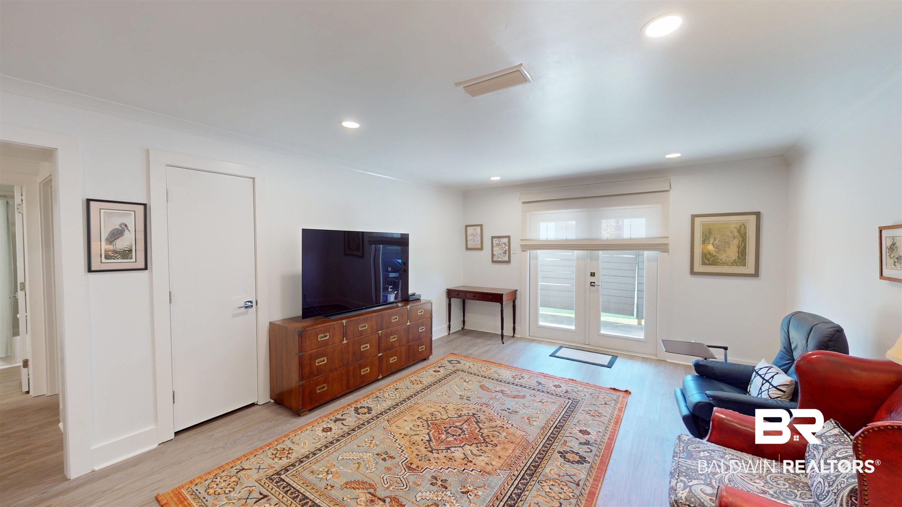 3655 Old Shell Road, Unit 219 Mobile, AL 36608 - Photo 4 of 25 Living area with light wood-style floors, recessed lighting, french doors, and ornamental molding