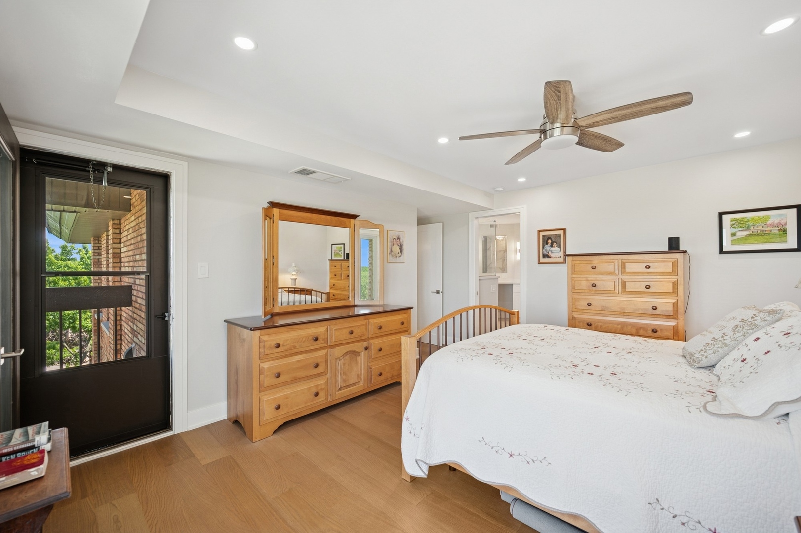 3801 Mission Hills Road, Unit 510 Northbrook, IL 60062 - Photo 12 of 19 a bedroom with a bed and wooden floor