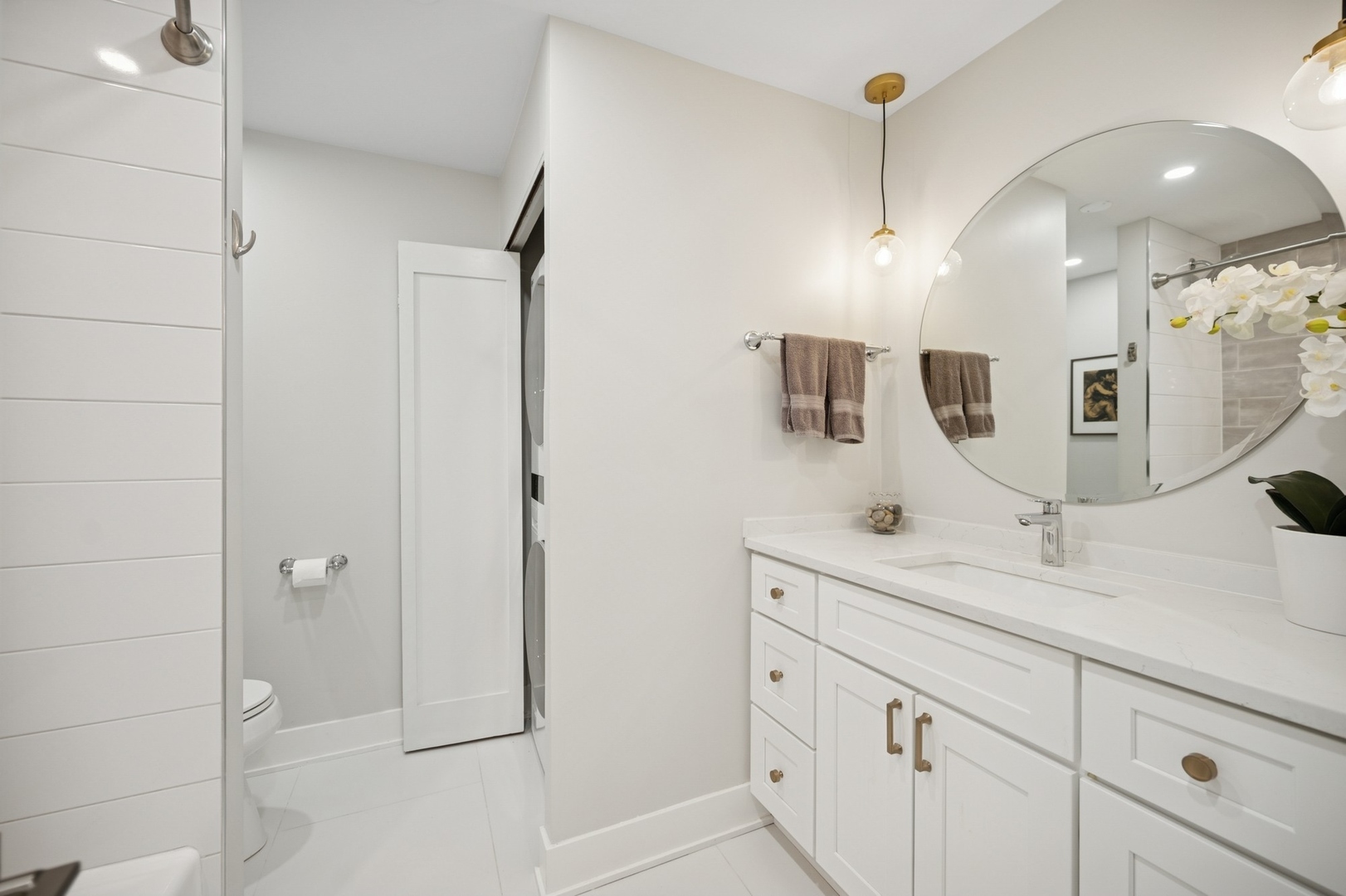 3801 Mission Hills Road, Unit 510 Northbrook, IL 60062 - Photo 16 of 19 a spacious bathroom with a double vanity sink a large mirror and shower