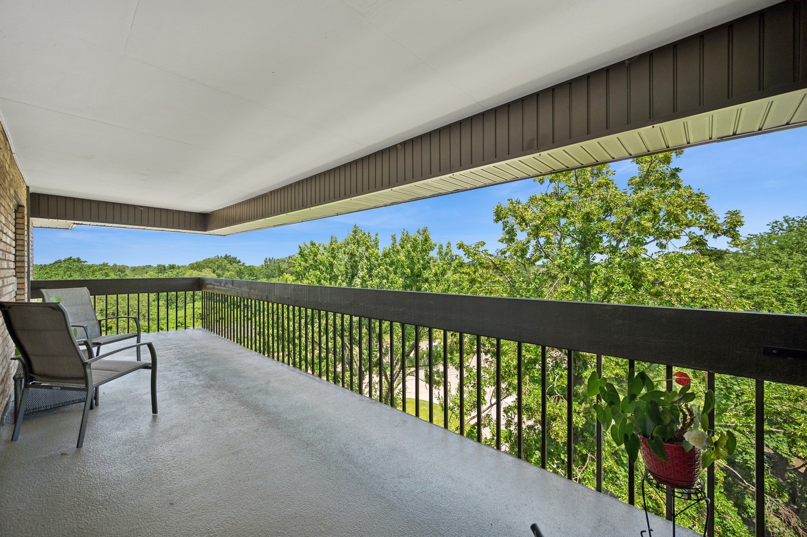 3801 Mission Hills Road, Unit 510 Northbrook, IL 60062 - Photo 17 of 19 a view of a two chair in the balcony