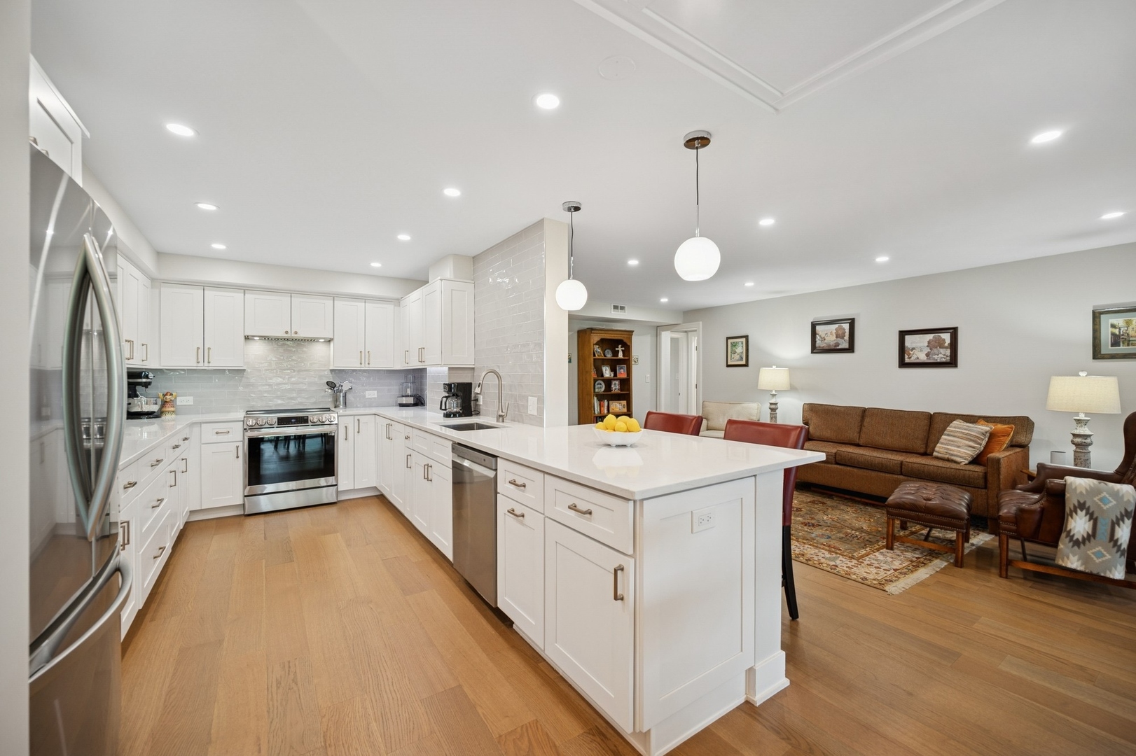 3801 Mission Hills Road, Unit 510 Northbrook, IL 60062 - Photo 8 of 19 a kitchen with white cabinets and stainless steel appliances