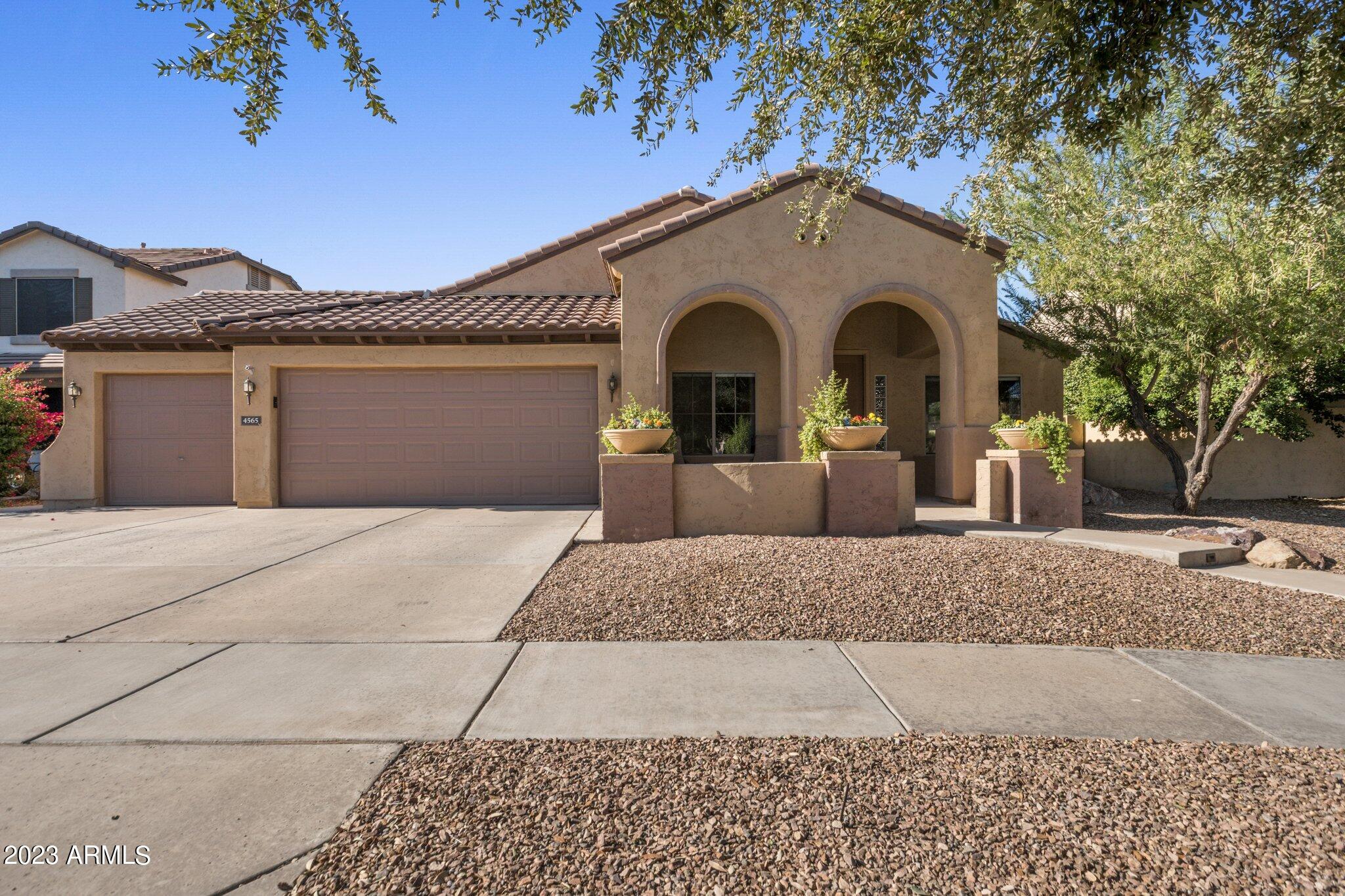 4565 East Ruffian Road Gilbert, AZ 85297 - Photo 1 of 47 a front view of a house