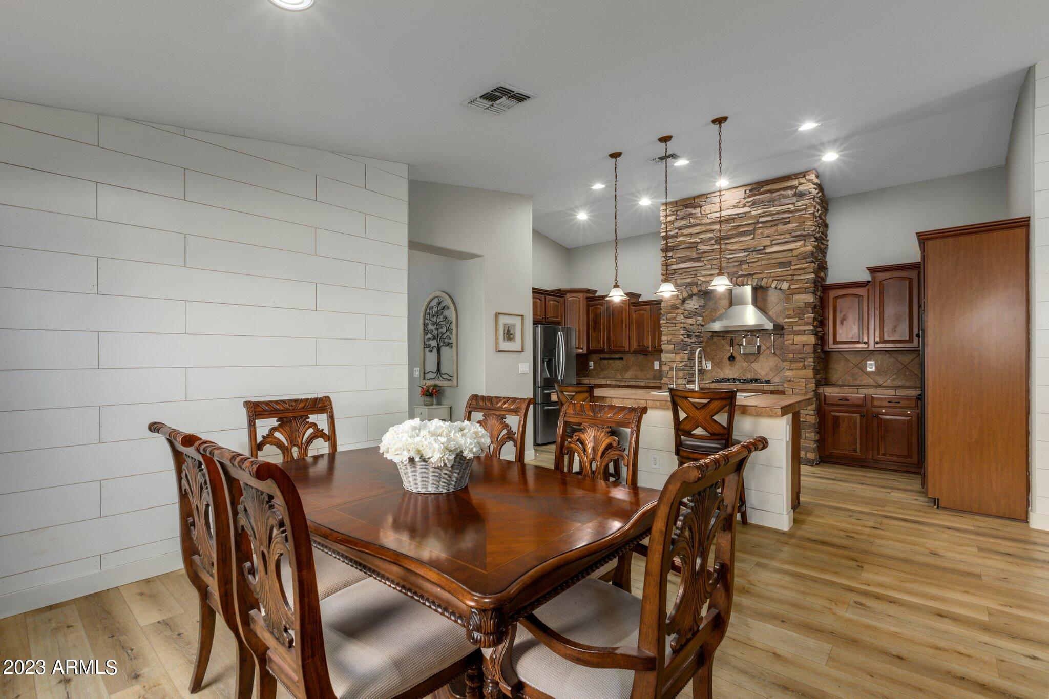 4565 East Ruffian Road Gilbert, AZ 85297 - Photo 13 of 47 a view of a dining room with furniture