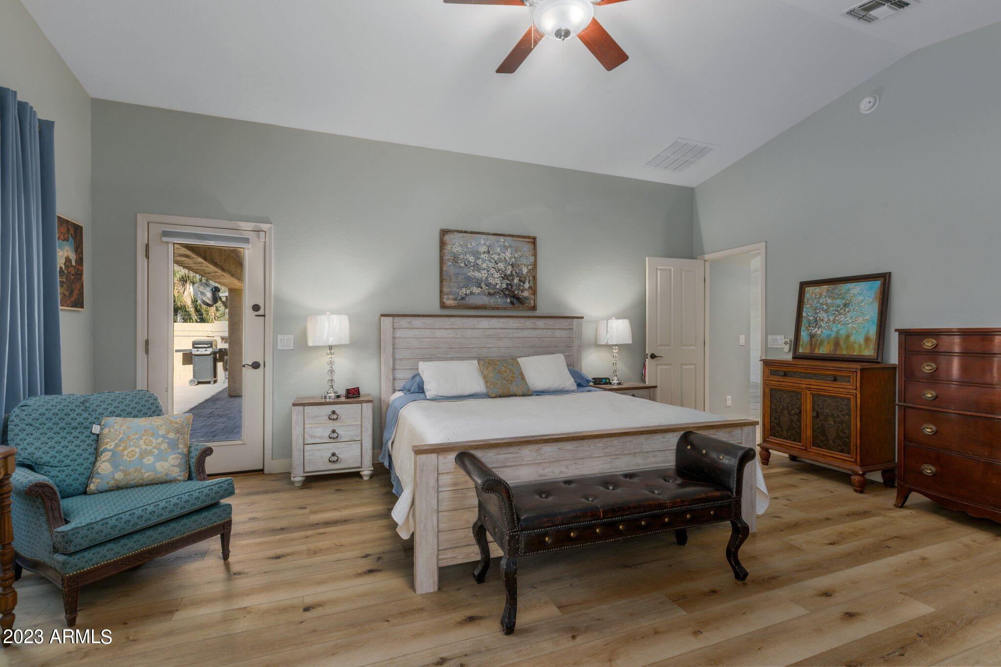 4565 East Ruffian Road Gilbert, AZ 85297 - Photo 19 of 47 a bedroom with a bed and a couch