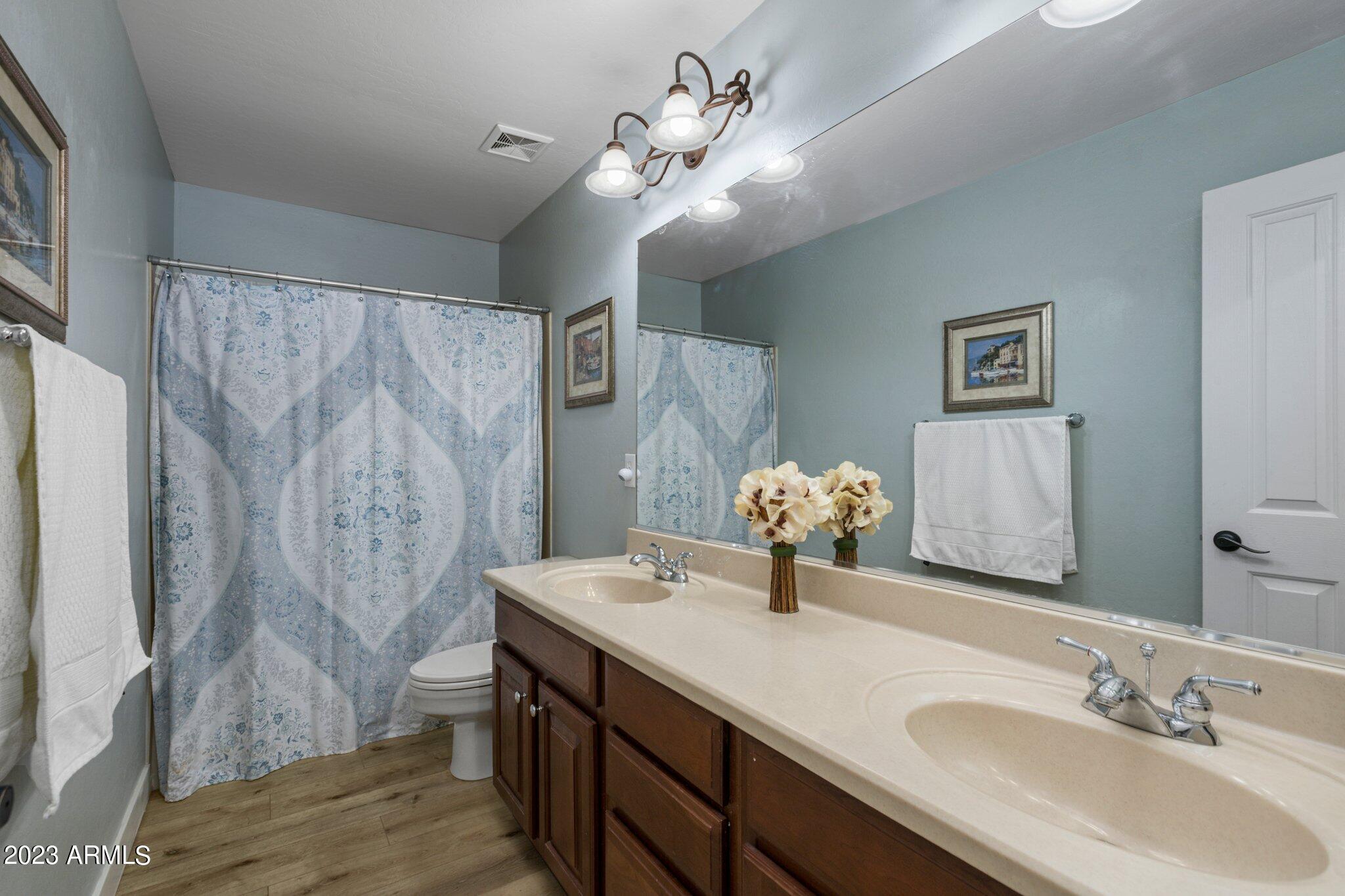 4565 East Ruffian Road Gilbert, AZ 85297 - Photo 23 of 47 a bathroom with 2 sink and a mirror