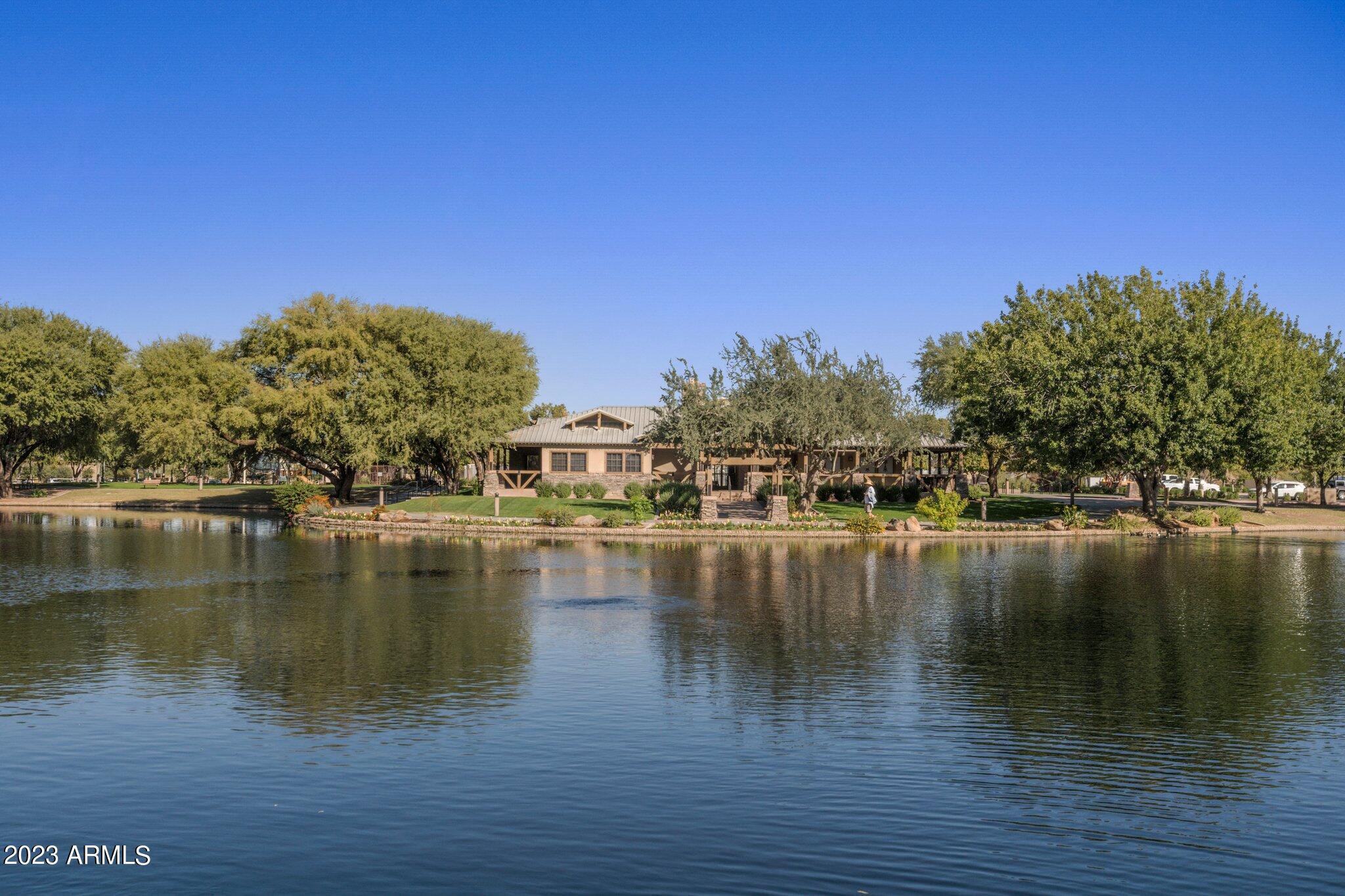 4565 East Ruffian Road Gilbert, AZ 85297 - Photo 38 of 47 a view of a lake with houses