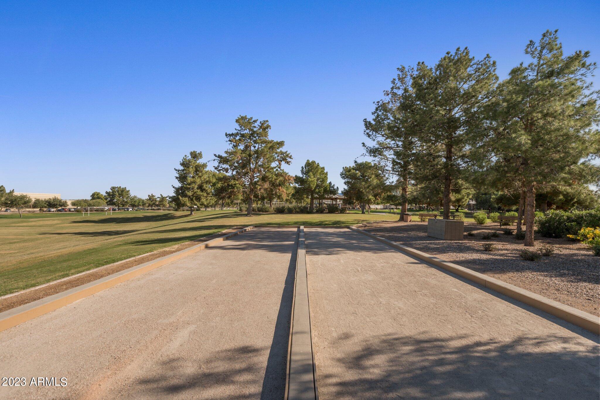 4565 East Ruffian Road Gilbert, AZ 85297 - Photo 44 of 47 a view of a lake with trees