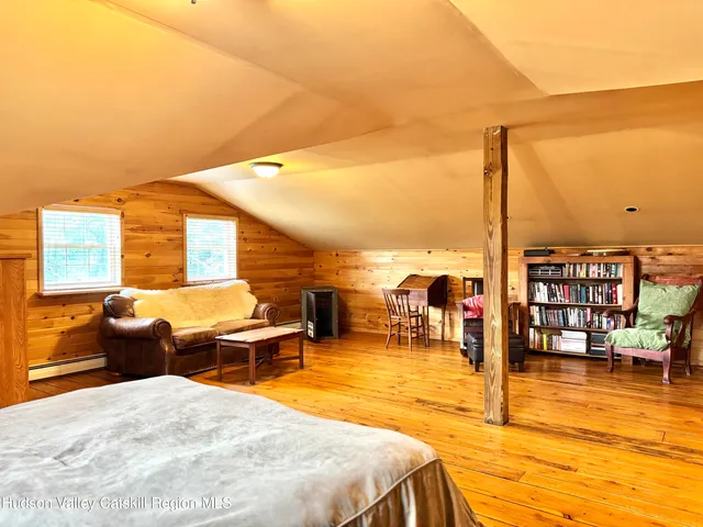 a bathroom with a toilet a sink and shower