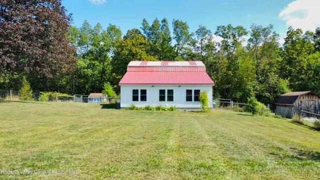 a childrens park with lots of swings and slides