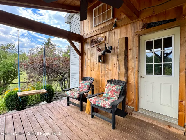 a outdoor living space with furniture and garden view