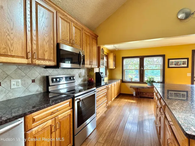 a view of a living room with furniture