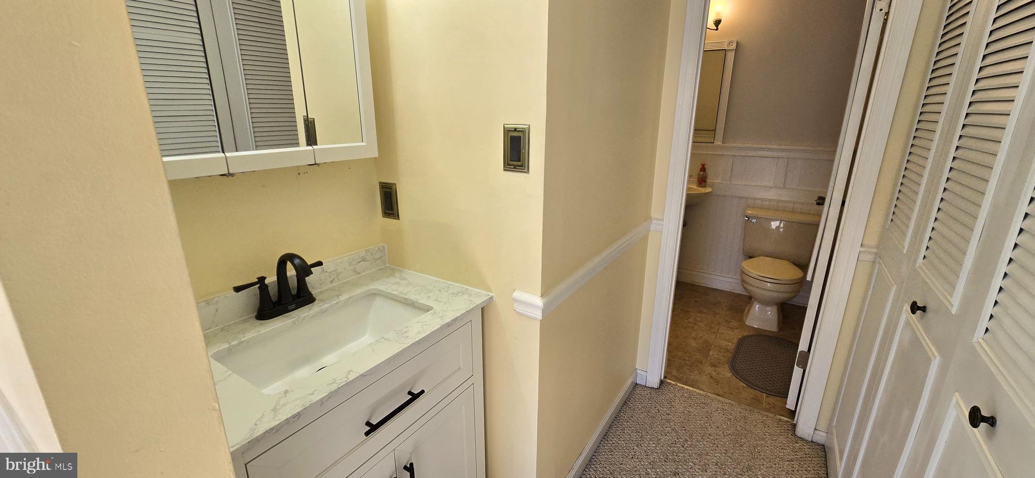 16 Dallington Court Perry Hall, MD 21128 - Photo 14 of 29 a bathroom with a sink and a vanity
