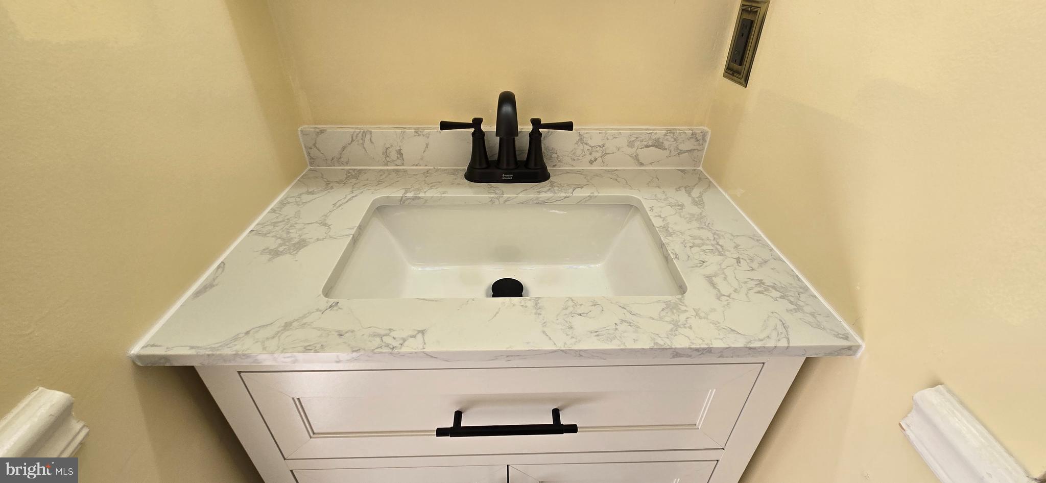16 Dallington Court Perry Hall, MD 21128 - Photo 15 of 29 a bathroom with a granite countertop sink