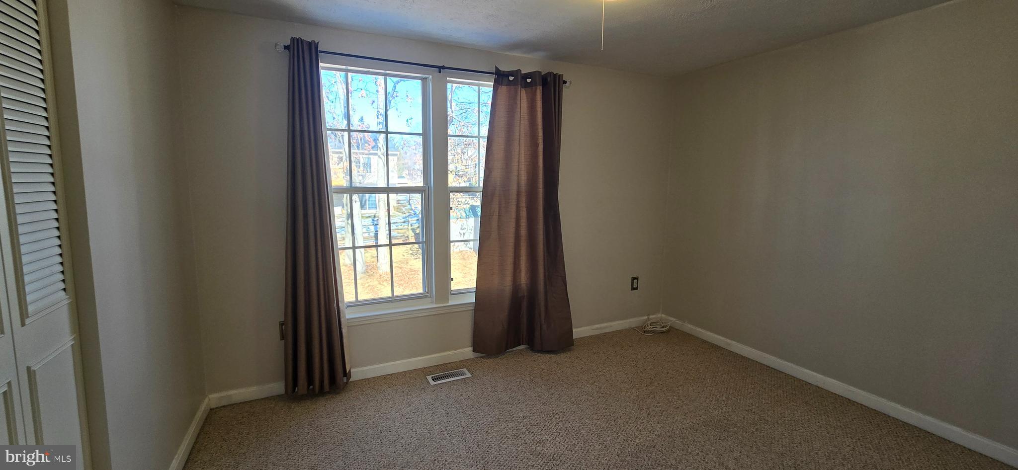 16 Dallington Court Perry Hall, MD 21128 - Photo 18 of 29 an empty room with windows