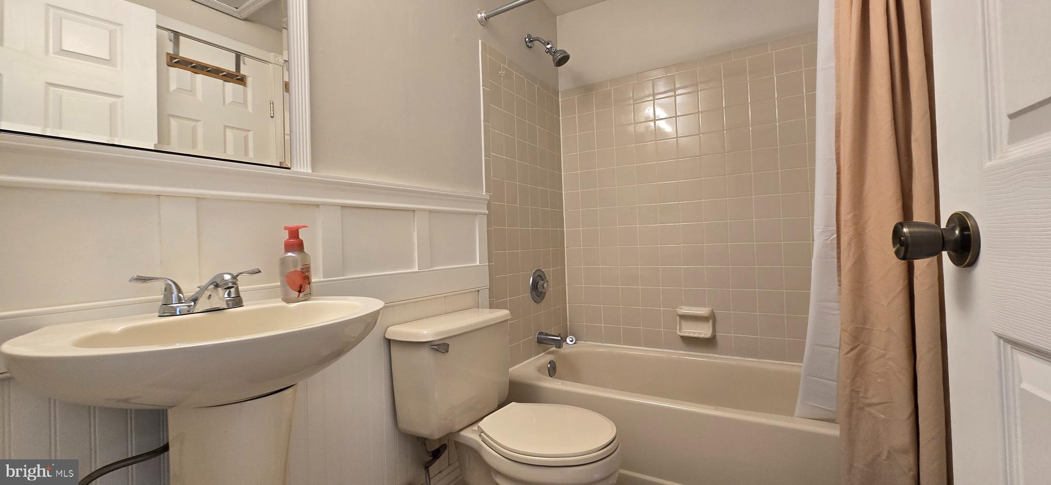 16 Dallington Court Perry Hall, MD 21128 - Photo 21 of 29 a bathroom with a sink a toilet and shower