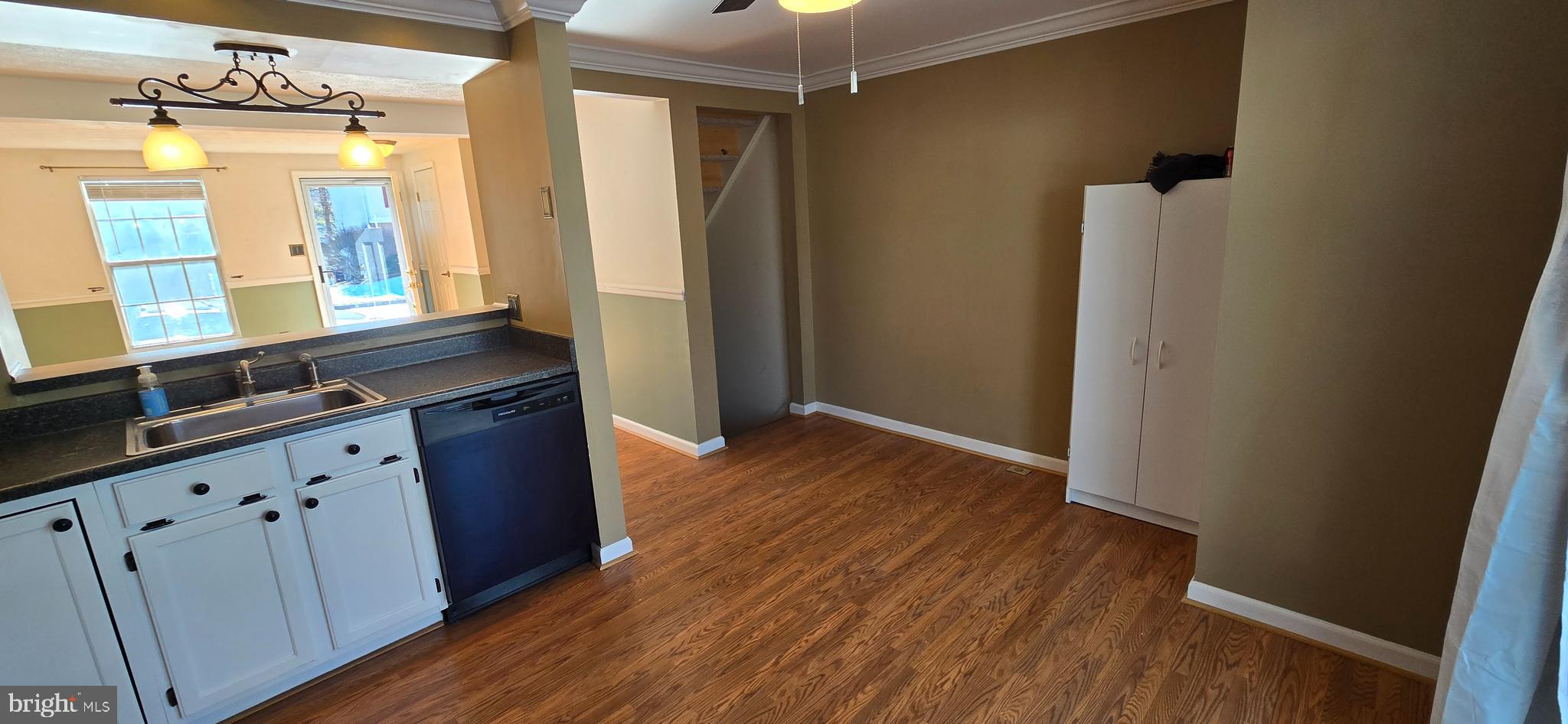 16 Dallington Court Perry Hall, MD 21128 - Photo 8 of 29 wooden floor in an empty room with a mirror