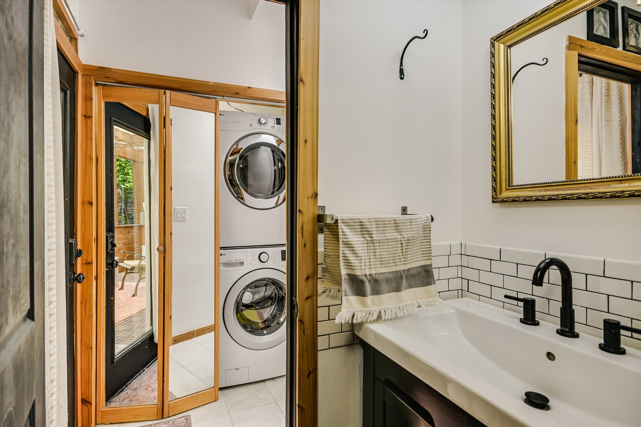 504 Powell Circle Austin, TX 78704 - Photo 12 of 23 a utility room with dryer and washer